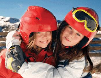 Aspen Childcare Kids wearing ski helmets and goggles